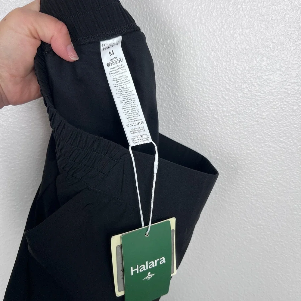 Halara Women's High Waisted Curved Hem Skort Pockets Black Sz M
